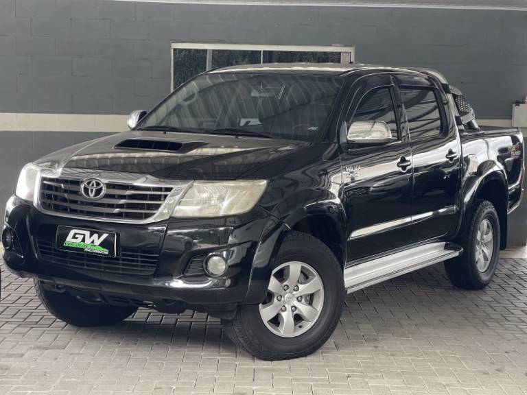 TOYOTA - HILUX - 2012/2013 - Preta - R$ 139.900,00