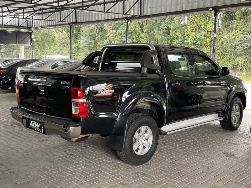 TOYOTA - HILUX - 2012/2013 - Preta - R$ 139.900,00